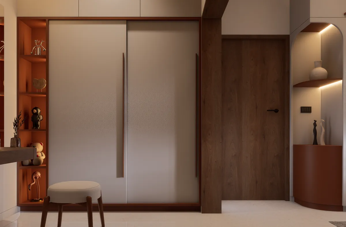 Sliding wardrobe with a lit, terracotta-backed display niche